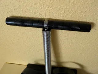 Ejercitador con muelle y Expansor de pecho.