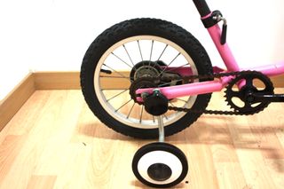 BICICLETA NIÑA BTWIN ROSA 14" CON RUEDINES 72796