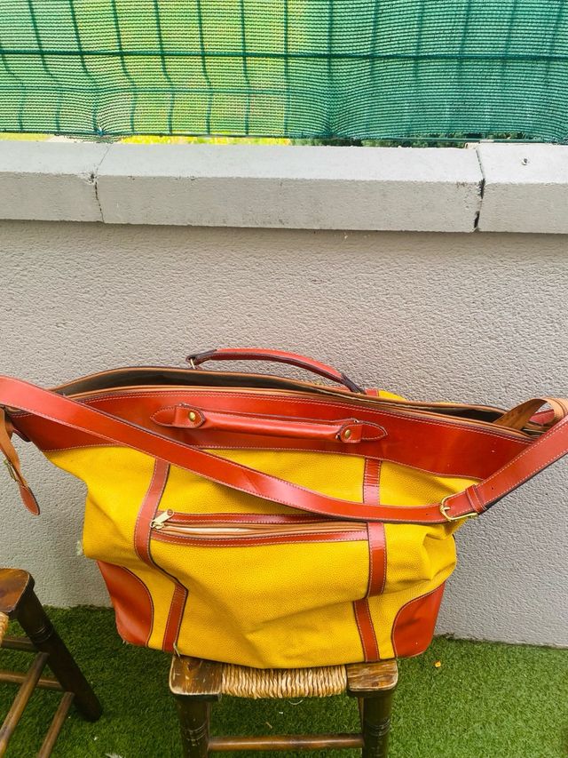 Bolsa/mochila de couro grande ideal para viagens