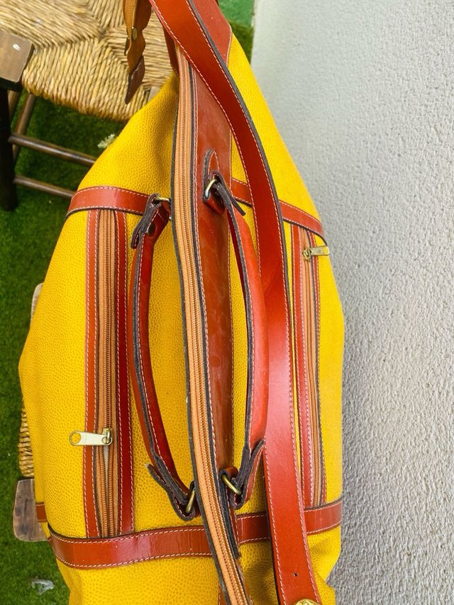 Bolsa/mochila de couro grande ideal para viagens