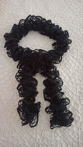 Sciarpa donna in lana lavorata a maglia.