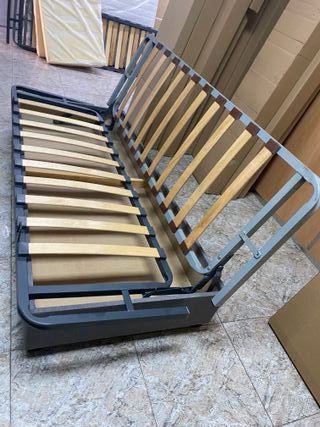 Sofá cama gris tela
