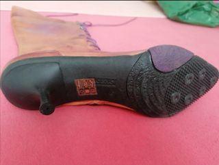 Botas de cuero rojizas con cordones