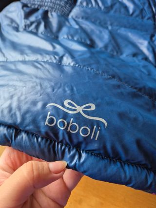 Chaqueta acolchada azul reversible con capucha