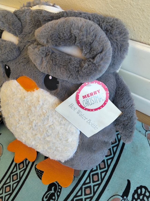 Calentador de pies pingüino suave