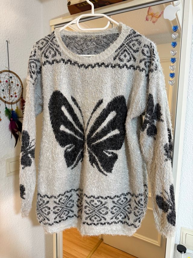 Jersey pelito mariposa gris y negro