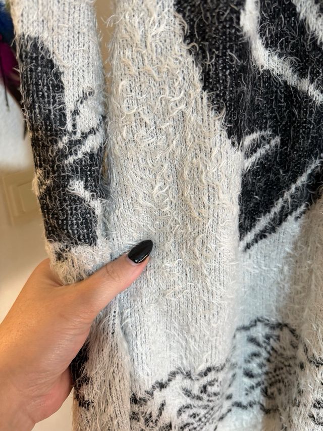 Jersey pelito mariposa gris y negro