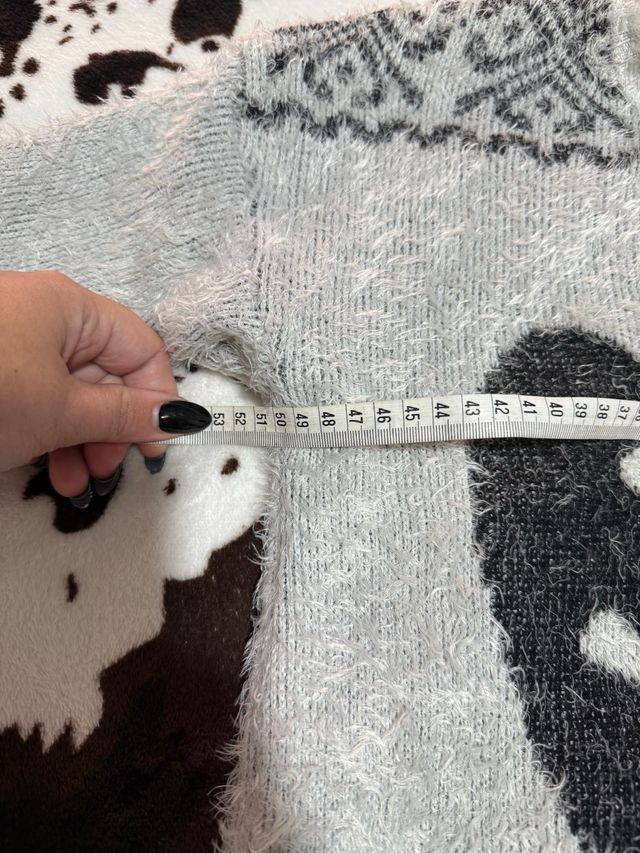 Jersey pelito mariposa gris y negro