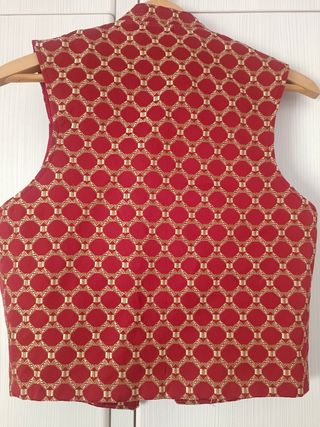 Chaleco fallero rojo y dorado