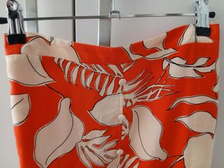 Falda larga naranja y beige Primark