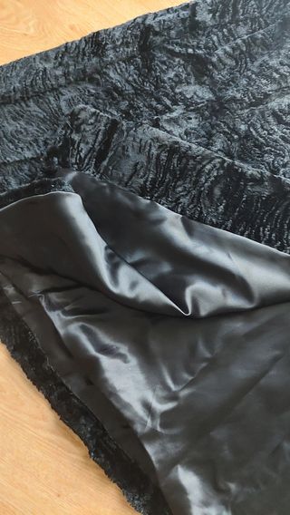 Cappotto finta pelliccia tipo Astrakan a ruota