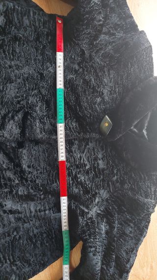 Cappotto finta pelliccia tipo Astrakan a ruota