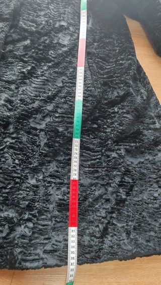 Cappotto finta pelliccia tipo Astrakan a ruota