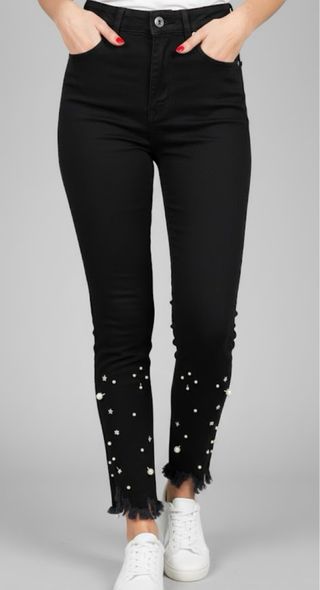 Pantaloni neri con spille