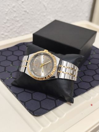 Reloj hombre dorado y plateado