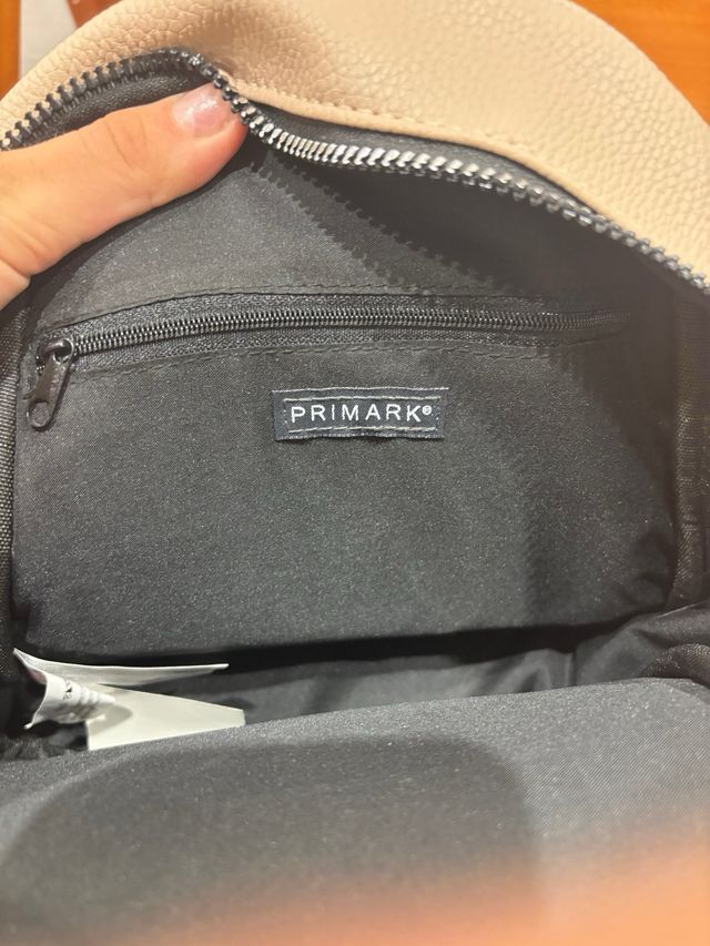 Mochila pequeña beige