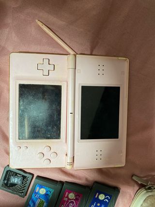 Nintendo DS Rosa con 6 Juegos y Funda Vaca
