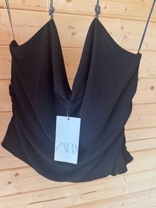  Top negro elegante con tirantes halter 