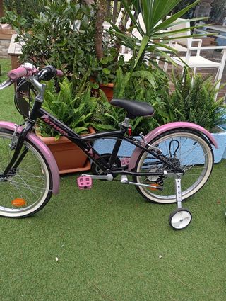 Bicicleta Betwin rosa y negra