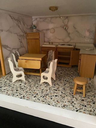 Casa de muñecas de madera