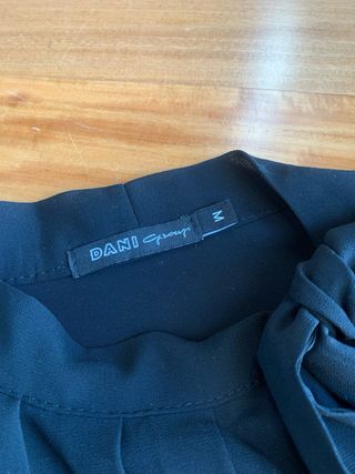 Blusa nera DANi con fiocco taglia m