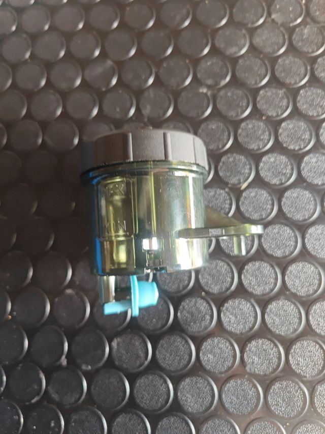 Bote líquido frenos moto