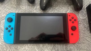 Nintendo Switch + Accesorios y Juegos