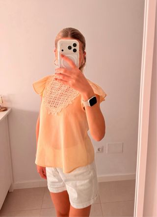 Blusa con detalles de encaje
