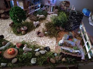 Villaggio presepe con luci e animali