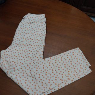 Pantalones estampados flores naranja etam