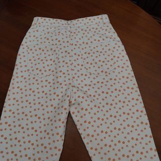 Pantalones estampados flores naranja etam