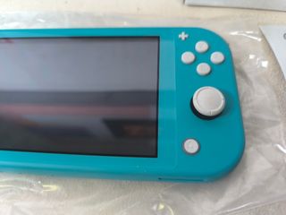 Nintendo Switch Lite Verde + Splatoon 2