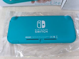 Nintendo Switch Lite Verde + Splatoon 2
