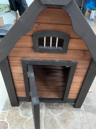Casa de madera para perros