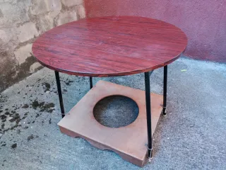 Mesa camilla con manta y estufa