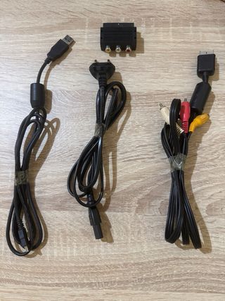 PS3 Slim con mandos y juegos