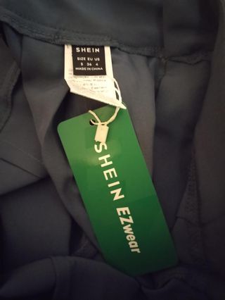 Conjunto falda y pantalón verde