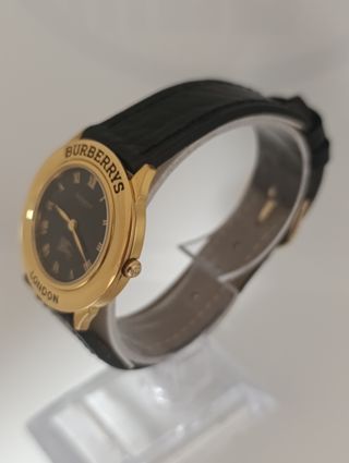 Reloj Burberrys de oro y correa negra