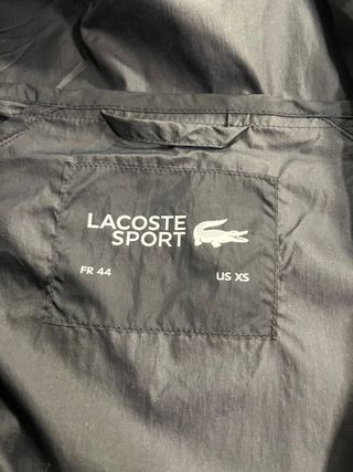 Cortavientos Lacoste Negro y verde lima.
