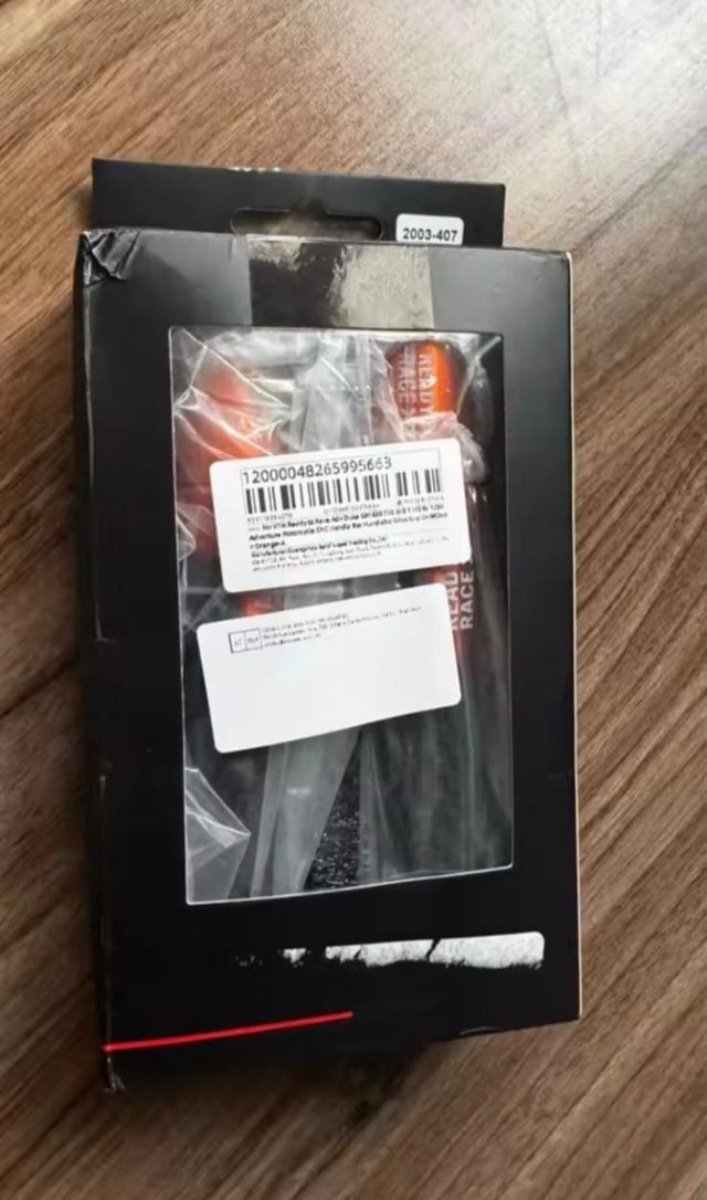 Puños y contrapesos moto naranjas