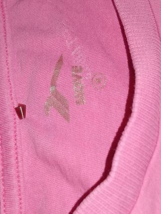 Top deportivo fucsia Décimas Talla M