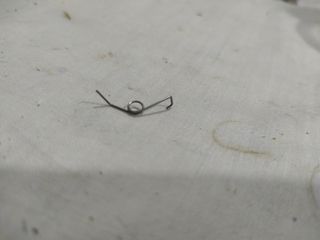 Muelle accion eje   Palanca freno DAIWA gs9