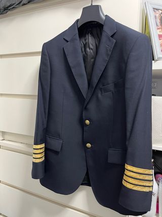 Tres Trajes de piloto Emidio Tucci azul