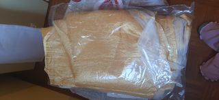 Tenda drappeggiata color oro