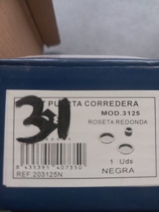 Tirador redondo negro para puerta corredera
