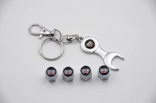 TAPONES RUEDAS CON LLAVERO AUDI