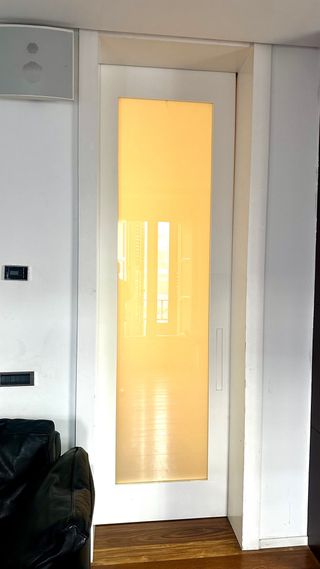 Puerta corredera cristal y madera
