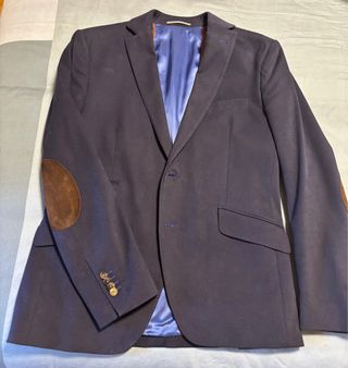 Americana de hombre azul con coderas
Micropana