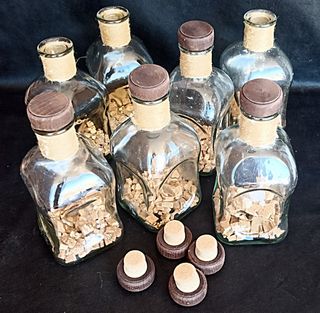 7 Botellas decorativas vacías