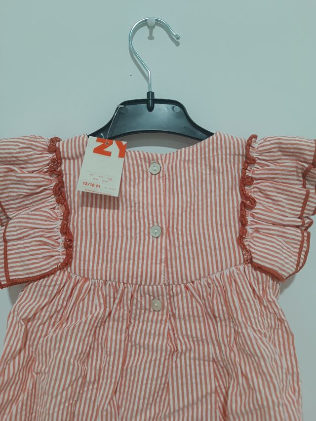 Jesusito bebé rayasrojas y blancas